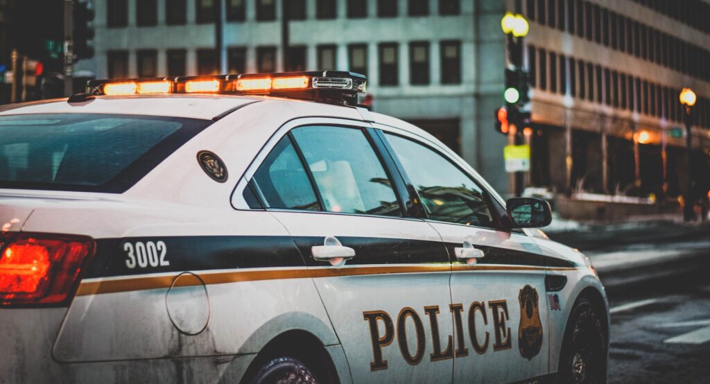 a police car standing for recording a complaint