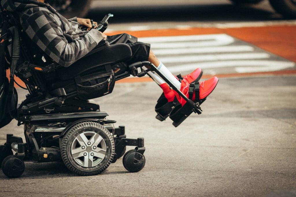 disabled person sitting on wheel chair